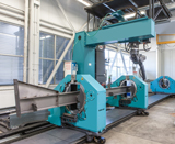Moderner Schwei�roboter zur Bearbeitung von Baugruppen mit Stahltr�gern und Anbauteilen � Kaltenbach